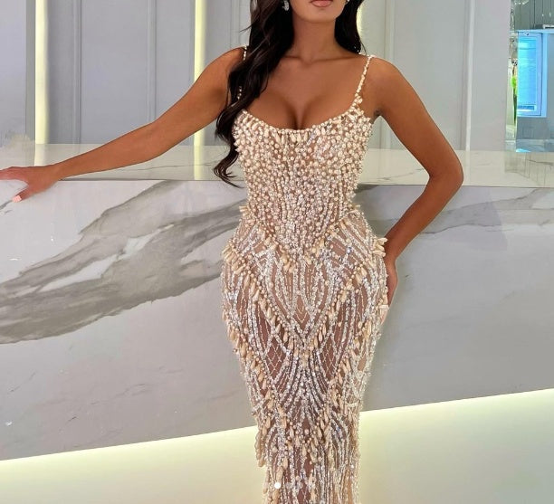 Mermaid Prom Dress with Spaghetti Straps and Sleeveless Design adorned with Beadings and Pearls